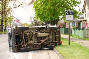 two vehicle accident when a person turned in front of this pickup causing it to roll over